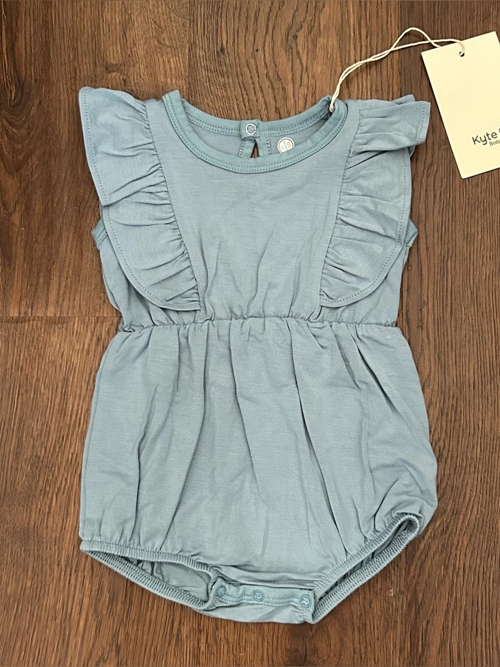 Kyte Short Sleeve Bubble Romper with Ruffles in Dusty Blue 3-6m